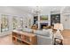 Bright living room with fireplace, stylish furnishings, and hardwood floors at 115 Brawley Harbor Pl, Mooresville, NC 28117
