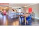 Inviting dining area adjacent to the kitchen, featuring hardwood floors and bright, open space at 116 Fordingbridge Ln, Mooresville, NC 28115