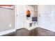 Entryway with storage bench, coat hooks, and white trim at 116 Fordingbridge Ln, Mooresville, NC 28115