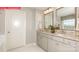 Bright bathroom featuring double vanity with granite countertops, undermount sinks and white cabinets at 124 Fordingbridge Ln, Mooresville, NC 28115