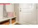 Mudroom entryway featuring a bench with storage and coat hooks at 124 Fordingbridge Ln, Mooresville, NC 28115