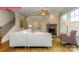 Bright living room featuring a stone fireplace and plush seating at 124 Fordingbridge Ln, Mooresville, NC 28115