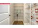 Well-organized pantry with wire shelving, providing ample space for storage of food and household items at 124 Fordingbridge Ln, Mooresville, NC 28115