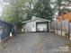 Exterior view of house with gravel parking at 128 Twin Bluff Trl # C52, Mount Gilead, NC 27306
