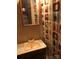 Cozy bathroom featuring a sink, framed mirror and colorful shower curtain at 128 Twin Bluff Trl # C52, Mount Gilead, NC 27306