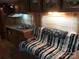 The RV has a kitchenette with a sink and storage space at 128 Twin Bluff Trl # C52, Mount Gilead, NC 27306