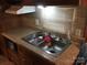 Close up of RV kitchen sink with faucet and counter space at 128 Twin Bluff Trl # C52, Mount Gilead, NC 27306