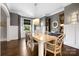Spacious dining room with elegant lighting, offering a sophisticated space for entertaining guests at 1311 Sunnys Halo Ln, Waxhaw, NC 28173