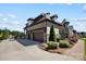 Elegant home featuring a two-car garage, manicured landscaping, and a beautiful brick exterior at 1311 Sunnys Halo Ln, Waxhaw, NC 28173