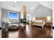 Bright main bedroom with a fireplace, hardwood flooring and a trey ceiling at 1311 Sunnys Halo Ln, Waxhaw, NC 28173