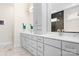 Modern bathroom with double vanity, marble countertops, and luxurious fixtures at 14015 Cameryn Elise Dr, Cornelius, NC 28031
