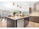 Spacious kitchen with a large island, granite countertops, stainless steel appliances, and open floor plan at 14015 Cameryn Elise Dr, Cornelius, NC 28031