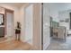 Bright Bedroom showcasing an open doorway, leading to a bathroom, and lovely interior design at 1505 Landis Ave, Charlotte, NC 28205