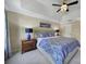 Spacious main bedroom with tray ceiling, blue accents, and ambient lighting for relaxation at 15101 Sharrow Bay Ct # 12, Huntersville, NC 28078