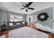 Inviting living room featuring hardwood floors, comfortable seating, and elegant decor at 15101 Sharrow Bay Ct # 12, Huntersville, NC 28078