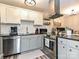 Modern kitchen features stainless steel appliances, granite countertops, and subway tile backsplash at 1615 Merry Oaks Rd # G, Charlotte, NC 28205