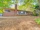 Charming brick home featuring a classic architectural design and lush green surroundings at 1881 Sharonwood Ln, Rock Hill, SC 29732