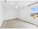 Large bedroom with carpeted floors, a ceiling fan, and a window overlooking the exterior at 1976 Ethan Ln, Stanfield, NC 28163