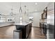 Spacious kitchen with a center island, stainless steel appliances, and an open floor plan at 1976 Ethan Ln, Stanfield, NC 28163