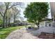 A spacious backyard with a patio, firepit, and a storage shed at 2064 Elizabeth Ave, Hickory, NC 28602