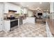 Modern kitchen open to the living room, with stainless appliances and white cabinets at 2064 Elizabeth Ave, Hickory, NC 28602