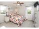 Cozy main bedroom with windows on two walls providing lots of natural light at 2064 Elizabeth Ave, Hickory, NC 28602