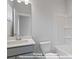 Bathroom featuring a shower, bathtub, and a wide vanity with grey cabinets at 212 Gilead Rd, Huntersville, NC 28078