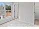 Bedroom with a window view and walk-in closet, providing ample storage space at 212 Gilead Rd, Huntersville, NC 28078