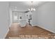 Open-concept living, dining and kitchen area filled with natural light at 212 Gilead Rd, Huntersville, NC 28078