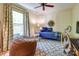 Cozy bedroom featuring a large window, comfortable bed, and a unique 'Lions' decor, perfect for relaxation at 2504 White Thorne Ln, Waxhaw, NC 28173