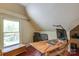 Bonus room with hardwood floors and a large window providing natural light at 2504 White Thorne Ln, Waxhaw, NC 28173