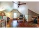 Bright bonus room with hardwood floors, desk area, and built-in storage at 2504 White Thorne Ln, Waxhaw, NC 28173