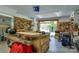 Spacious garage featuring work benches, peg board, and roll-up door to yard at 2504 White Thorne Ln, Waxhaw, NC 28173