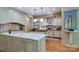 Bright kitchen with marble countertops and custom cabinets at 2504 White Thorne Ln, Waxhaw, NC 28173