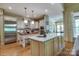 Elegant kitchen boasting stainless steel appliances and a marble island at 2504 White Thorne Ln, Waxhaw, NC 28173