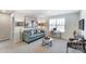 Versatile flex room featuring a comfortable couch, a desk, and natural light at 2624 Tillman St, Monroe, NC 28112