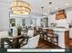 Open concept dining, kitchen, and living area with a spacious layout and natural light at 280 Gilead Rd, Huntersville, NC 28078