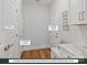 Drop zone off kitchen with pantry, storage closet, and access to garage door at 280 Gilead Rd, Huntersville, NC 28078