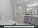 Main bath with bench shower, dual vanities, and two walk-in closets at 280 Gilead Rd, Huntersville, NC 28078