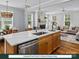 Bright, open-concept space with a gourmet kitchen, dining area, and a comfortable living area with a fireplace at 280 Gilead Rd, Huntersville, NC 28078