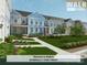 Street view of townhomes with landscaped front yards, covered porches, and sidewalks at 280 Gilead Rd, Huntersville, NC 28078
