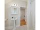 Charming bathroom featuring black and white tile floor and a pedestal sink at 3005 Somerset Dr, Charlotte, NC 28209