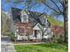 Charming home featuring classic architecture, a well-maintained lawn, and mature trees at 3005 Somerset Dr, Charlotte, NC 28209