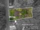 Aerial view of the property with lot lines, showcasing its location at 313 E Church St, Stanley, NC 28164