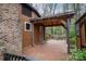 The wooden deck features a covered seating area with outdoor ceiling fan at 313 E Church St, Stanley, NC 28164