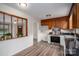 Traditional kitchen features a stainless steel oven, wood cabinetry, and sleek countertops at 313 E Church St, Stanley, NC 28164