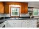 Kitchen featuring a sink, stainless appliances, and lots of storage at 313 E Church St, Stanley, NC 28164