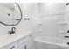 Bathroom features a modern vanity, sink, and shower-tub combination at 3433 Byrnes St, Charlotte, NC 28205