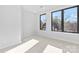 Bedroom featuring neutral paint, carpet flooring, and ample natural light at 3433 Byrnes St, Charlotte, NC 28205