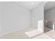 Well-lit bedroom with neutral carpet and white walls at 3437 Byrnes St, Charlotte, NC 28205